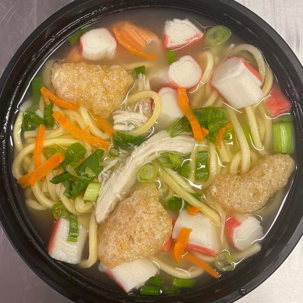 Maui Teriyaki and Sushi's Japanese udon noodle soup with chicken, crab, carrots, and scallions.